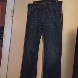 Women buckle pre owned jeans.  Nice